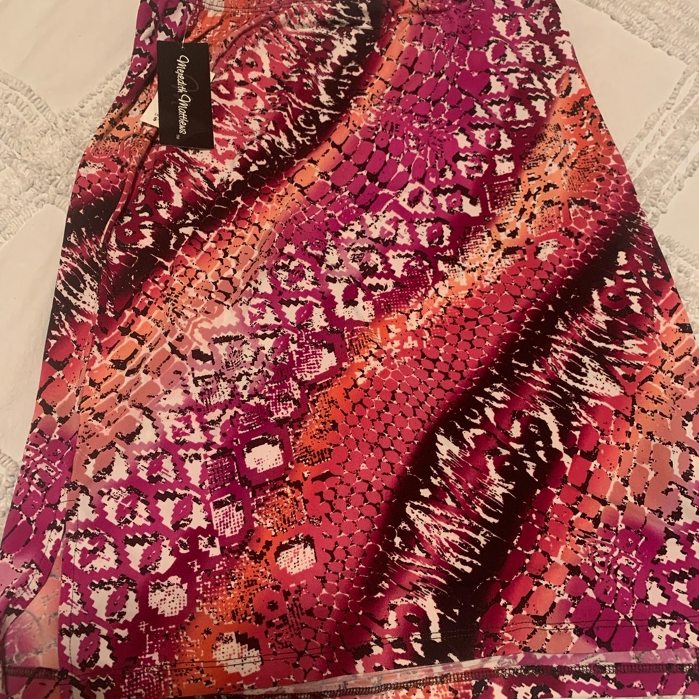 Colorful animal print skirt with side slit.
